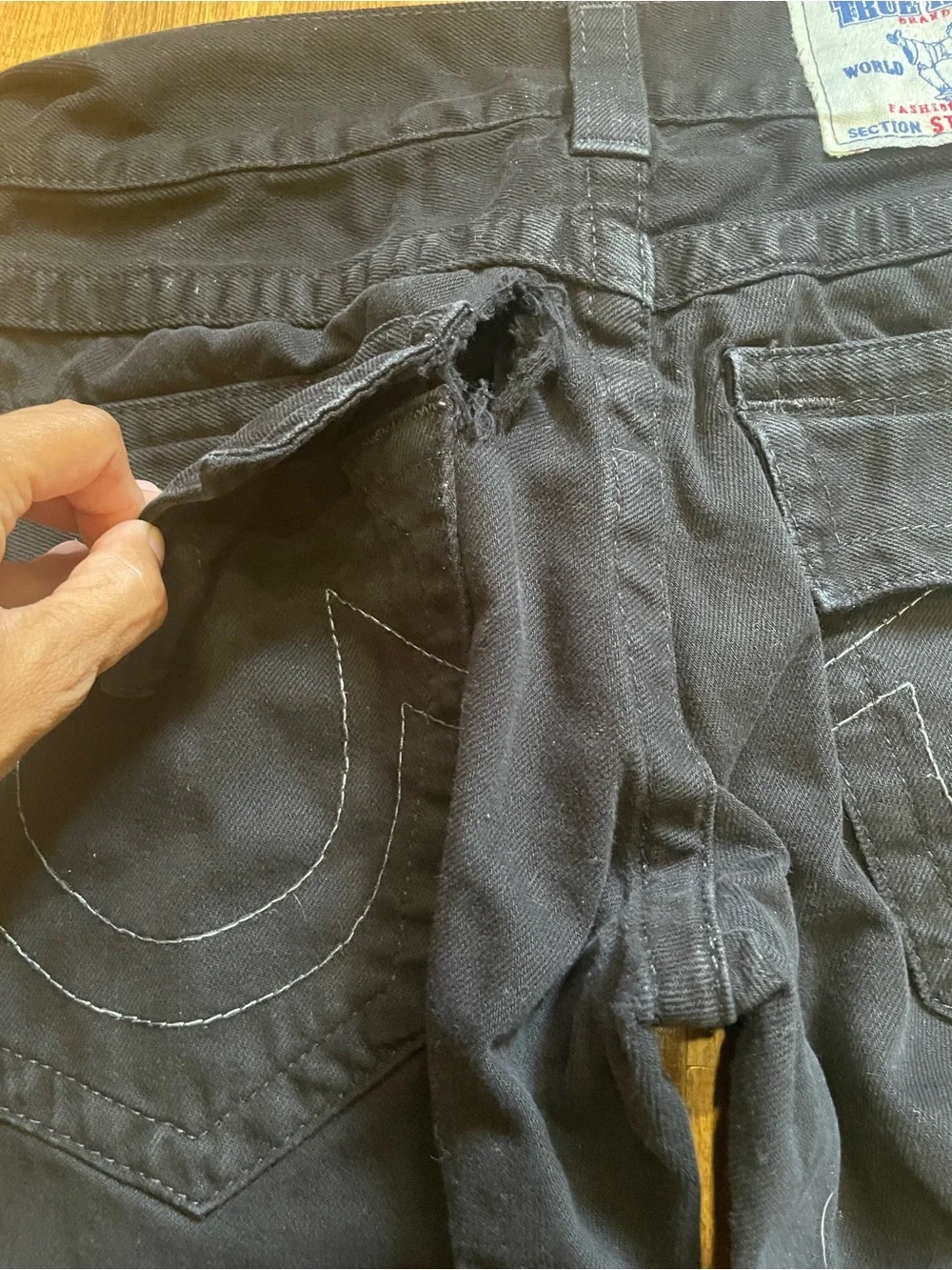 True Religion Black Jeans with White Label and Blue/Red Logo